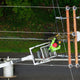 An Empire Fiber Internet technician works from a bucket truck to install fiber cable on a utility pole. (Patrick Schneider/Empire Fiber Internet)